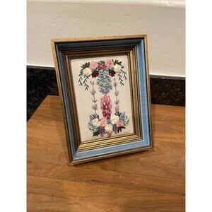Decorative framed floral embroidery